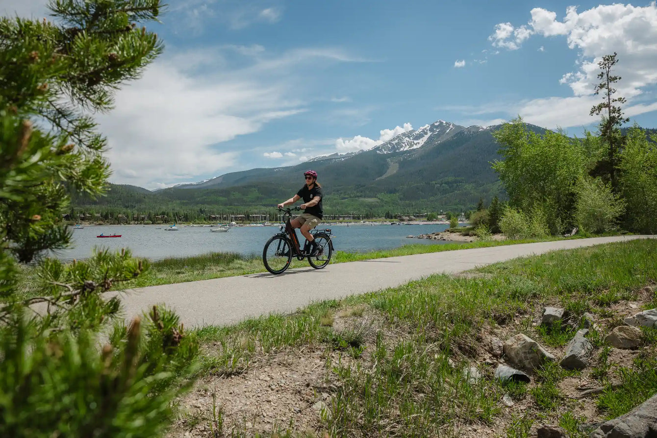 Rider on e-bike on Summit County paved trail in Colorado